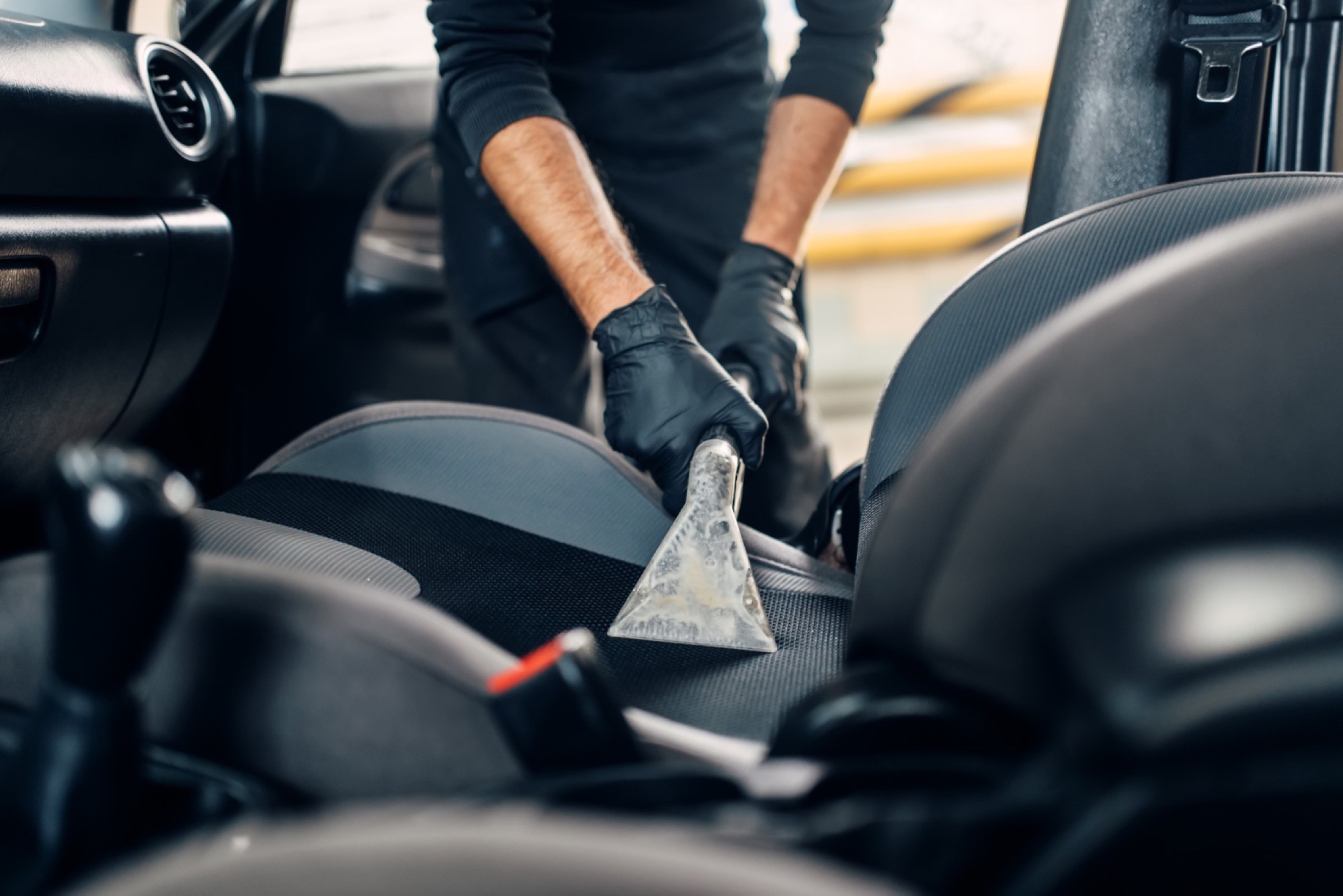 Interior seat extraction during a mobile detailing service